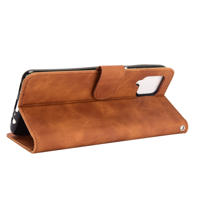 For Samsung Galaxy A12 / M12 / F12 Solid Color Skin Feel Magnetic Buckle Horizontal Flip Calf Texture PU Leather Case with Holder & Card Slots & Wallet(Brown) by buy2fix
