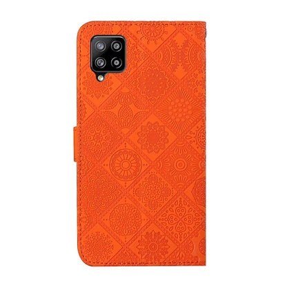 For Samsung Galaxy A12 Ethnic Style Embossed Pattern Horizontal Flip Leather Case with Holder & Card Slots & Wallet & Lanyard(Orange) by buy2fix