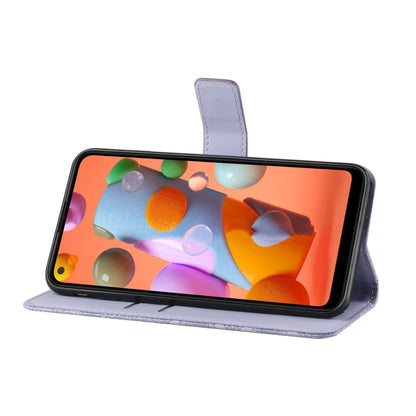 For Samsung Galaxy M11 Ethnic Style Embossed Pattern Horizontal Flip Leather Case with Holder & Card Slots & Wallet & Lanyard(Purple) by buy2fix