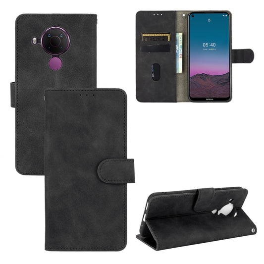 For Nokia 5.4 Solid Color Skin Feel Magnetic Buckle Horizontal Flip Calf Texture PU Leather Case with Holder & Card Slots & Wallet(Black) - Nokia Cases by buy2fix | Online Shopping UK | buy2fix