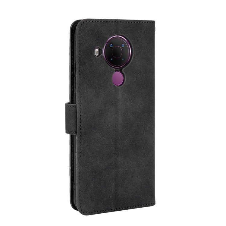 For Nokia 5.4 Solid Color Skin Feel Magnetic Buckle Horizontal Flip Calf Texture PU Leather Case with Holder & Card Slots & Wallet(Black) - Nokia Cases by buy2fix | Online Shopping UK | buy2fix