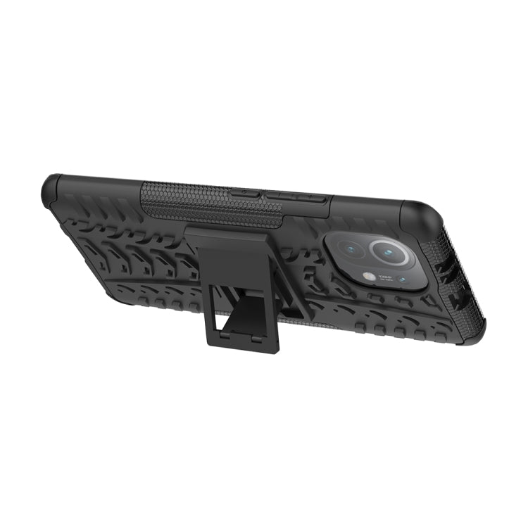 For Xiaomi Mi 11 Tire Texture Shockproof TPU+PC Protective Case with Holder(Black) - Xiaomi Cases by buy2fix | Online Shopping UK | buy2fix