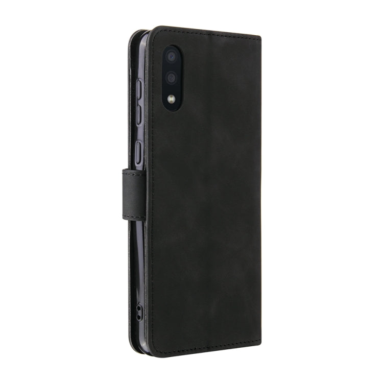 For Samsung Galaxy A02 / M02 Solid Color Skin Feel Magnetic Buckle Horizontal Flip Calf Texture PU Leather Case with Holder & Card Slots & Wallet(Black) by buy2fix