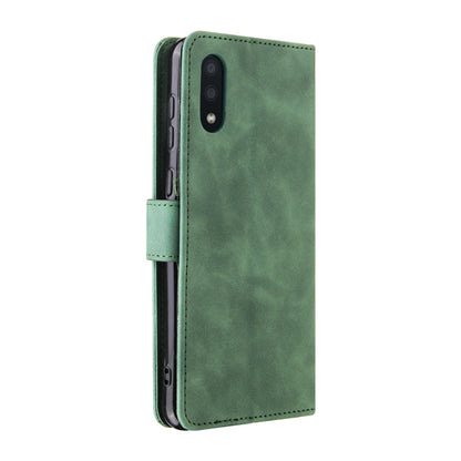 For Samsung Galaxy A02 / M02 Solid Color Skin Feel Magnetic Buckle Horizontal Flip Calf Texture PU Leather Case with Holder & Card Slots & Wallet(Green) by buy2fix