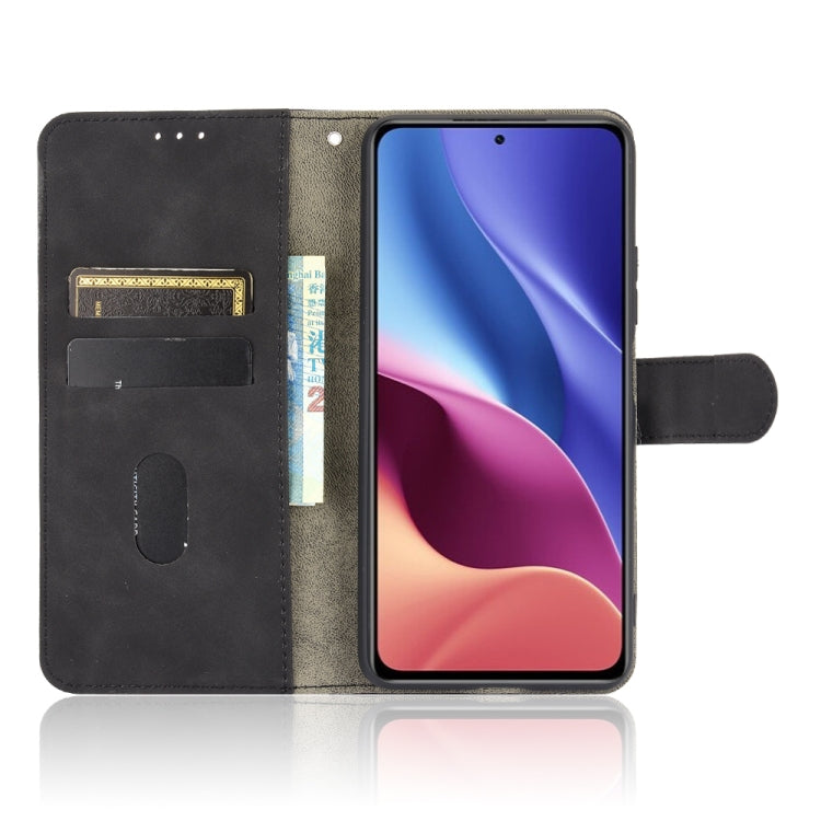 For Xiaomi Redmi K40 / K40 Pro Solid Color Skin Feel Magnetic Buckle Horizontal Flip Calf Texture PU Leather Case with Holder & Card Slots & Wallet(Black) - Xiaomi Cases by buy2fix | Online Shopping UK | buy2fix