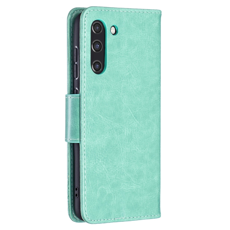 For Samsung Galaxy S21 FE Embossing Two Butterflies Pattern Horizontal Flip PU Leather Case with Holder & Card Slot & Wallet & Lanyard(Green) by buy2fix