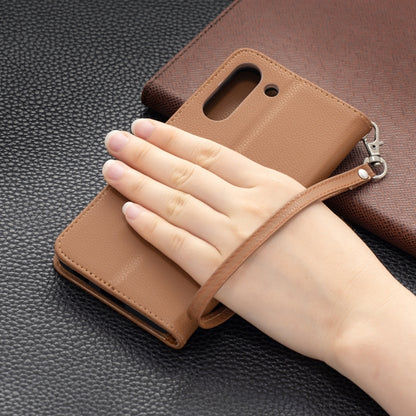 For Samsung Galaxy S21 FE / S21 Lite Litchi Texture Pure Color Horizontal Flip Leather Case with Holder & Card Slots & Wallet & Lanyard(Brown) by buy2fix