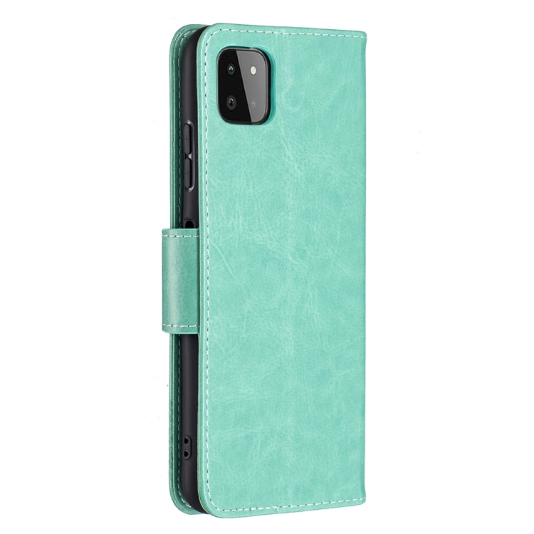 For Samsung Galaxy A22 5G Embossing Two Butterflies Pattern Horizontal Flip PU Leather Case with Holder & Card Slot & Wallet & Lanyard(Green) by buy2fix