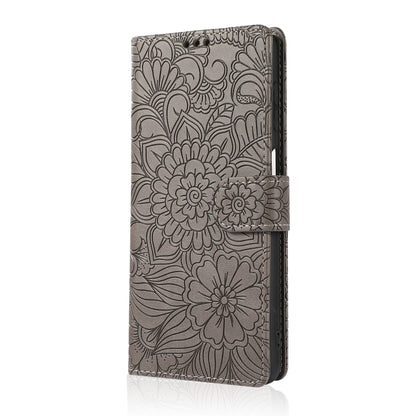 For Samsung Galaxy A12 Skin Feel Embossed Sunflower Horizontal Flip Leather Case with Holder & Card Slots & Wallet & Lanyard(Gray) by buy2fix