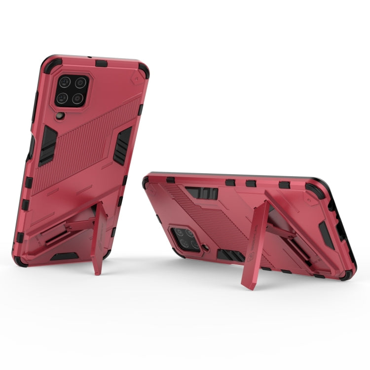 For Samsung Galaxy M32 Punk Armor 2 in 1 PC + TPU Shockproof Case with Invisible Holder(Light Red) by buy2fix