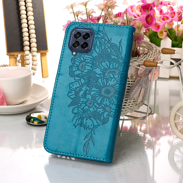 For Samsung Galaxy M33 5G Embossed Butterfly Leather Phone Case(Blue) by buy2fix