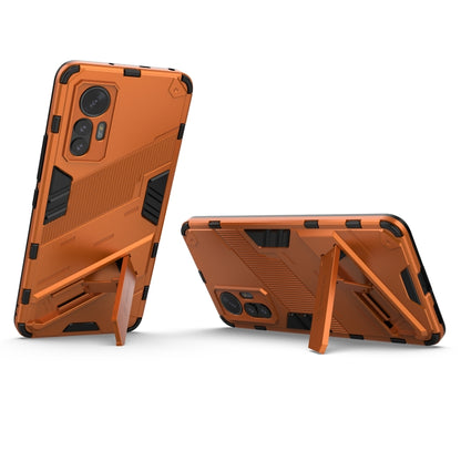 For Xiaomi 12 Lite Punk Armor PC + TPU Phone Case with Holder(Orange) - Xiaomi Cases by buy2fix | Online Shopping UK | buy2fix