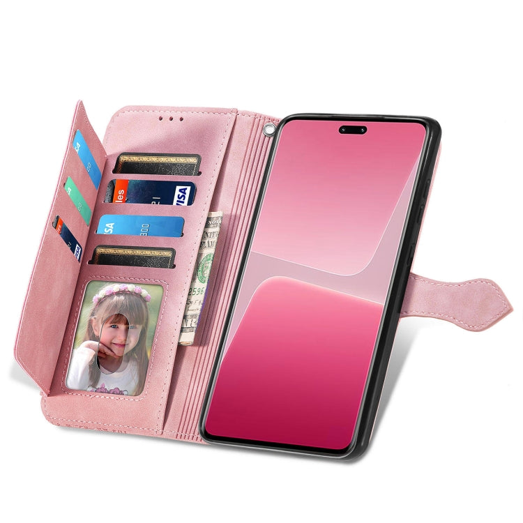 For Xiaomi 13 Lite Embossed Flower Zipper Leather Phone Case(Pink) - Xiaomi Cases by buy2fix | Online Shopping UK | buy2fix